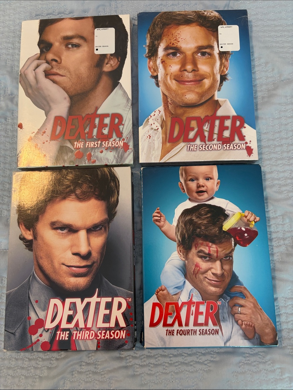 Dexter DVD Box Sets with Blue and White Covers